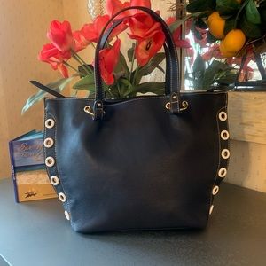 Chico NEW Navy Blue tote, zippered, Gold hardware. 6 White “0” rings on sides.